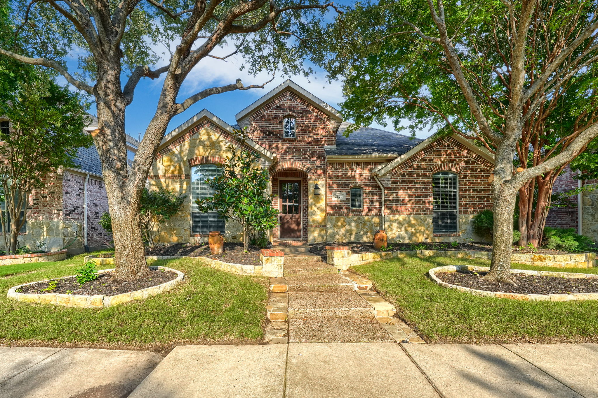 Stunning exterior view of luxury 4-bedroom home at 2128 Chambers Dr, Allen TX 75013 in prestigious Starcreek community